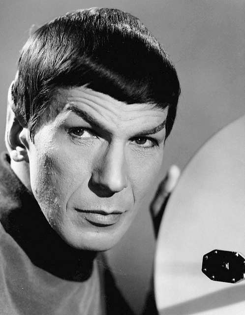 Photograph of Leonard Nimoy as Spock in Star Trek. Shows actor looking directly at the camera.